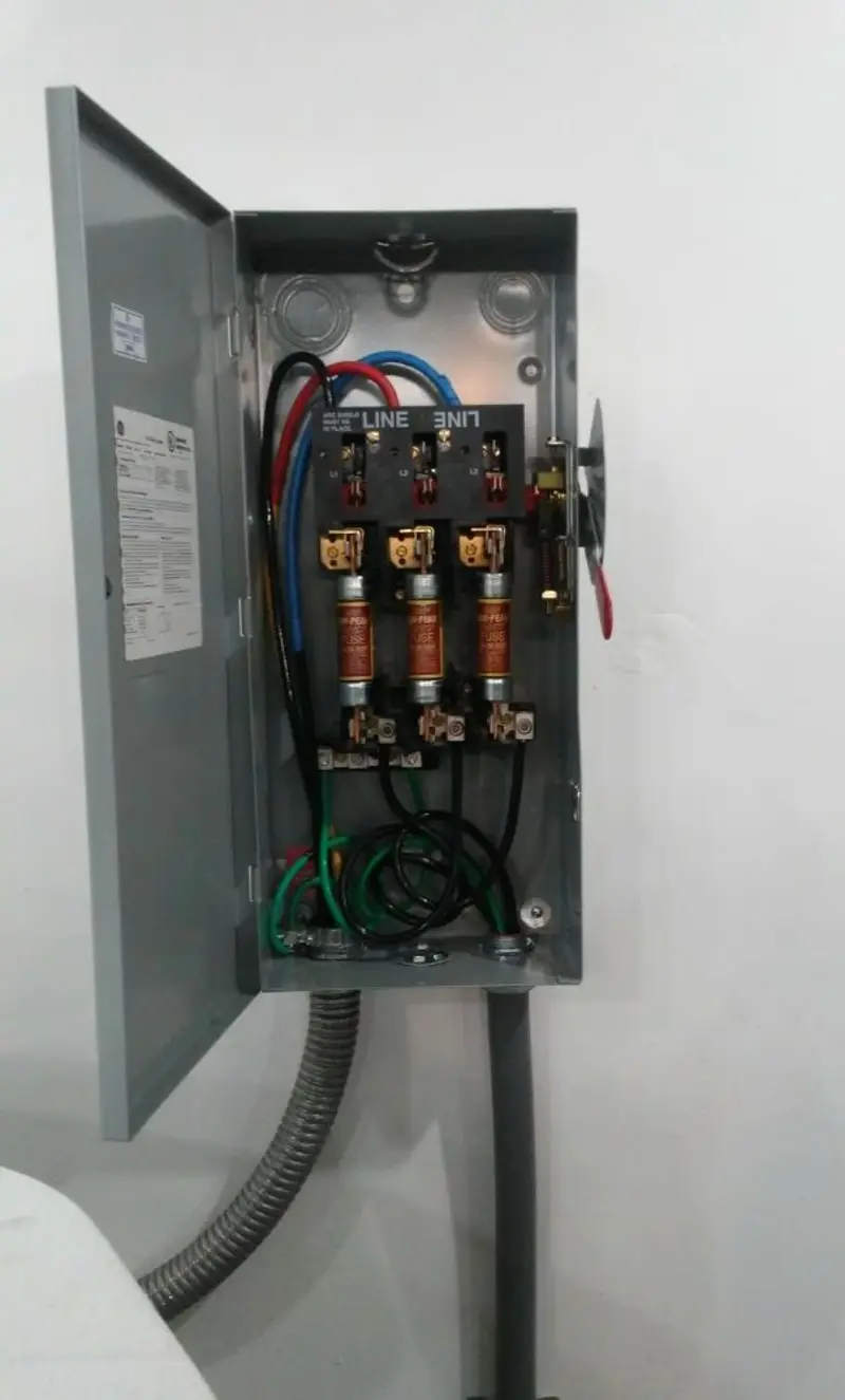 Three-phase disconnect switch installed for Smoke Detector Installation in Iowa